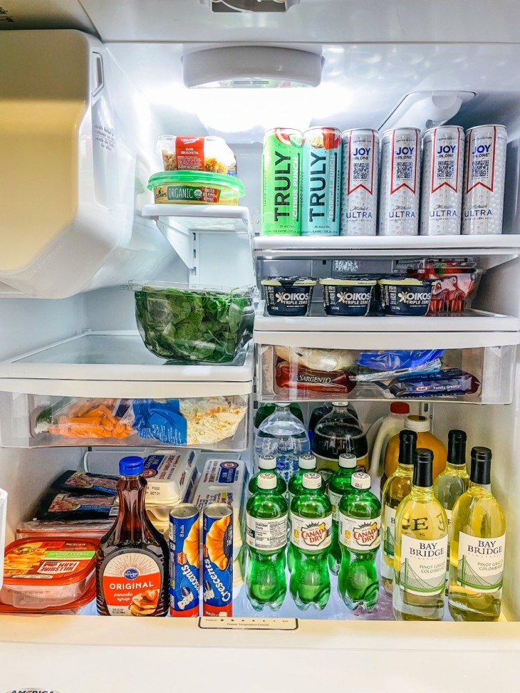 an open refrigerator filled with food