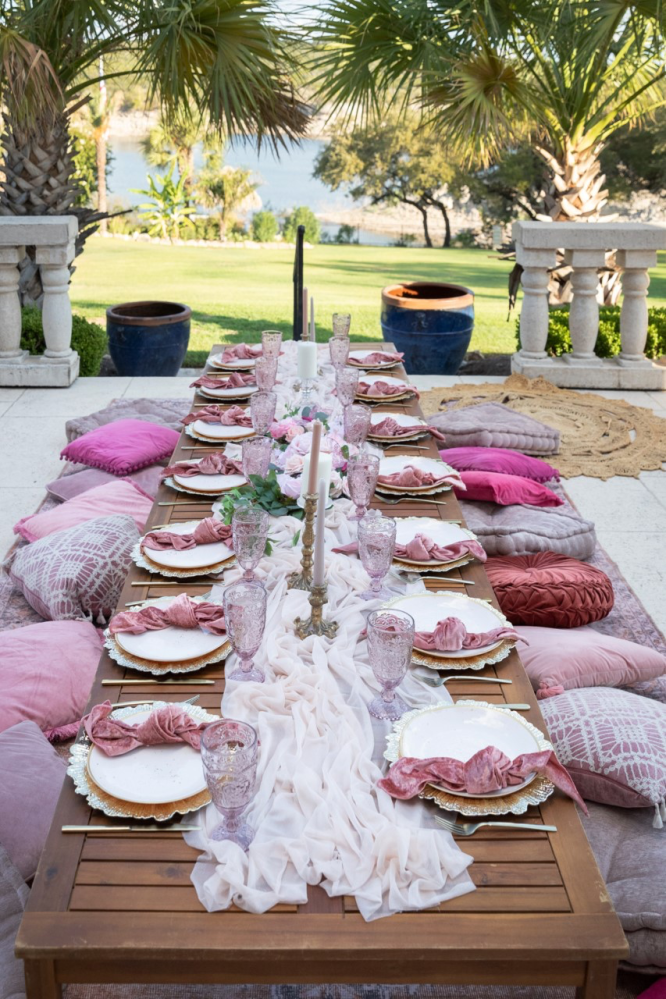 a bunch of pink flowers on a table