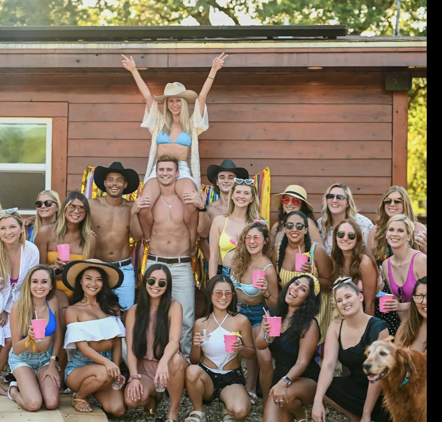 a group of people posing for a photo